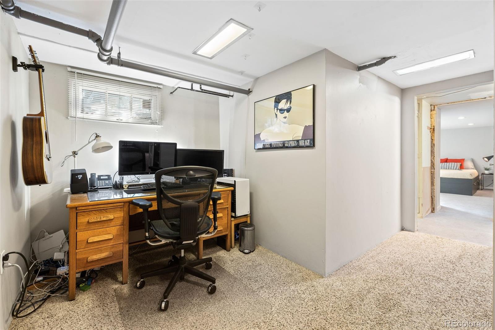 1205 Niagara Street Denver, CO 80220 - Photo 28 of 38 a view of a workspace with furniture