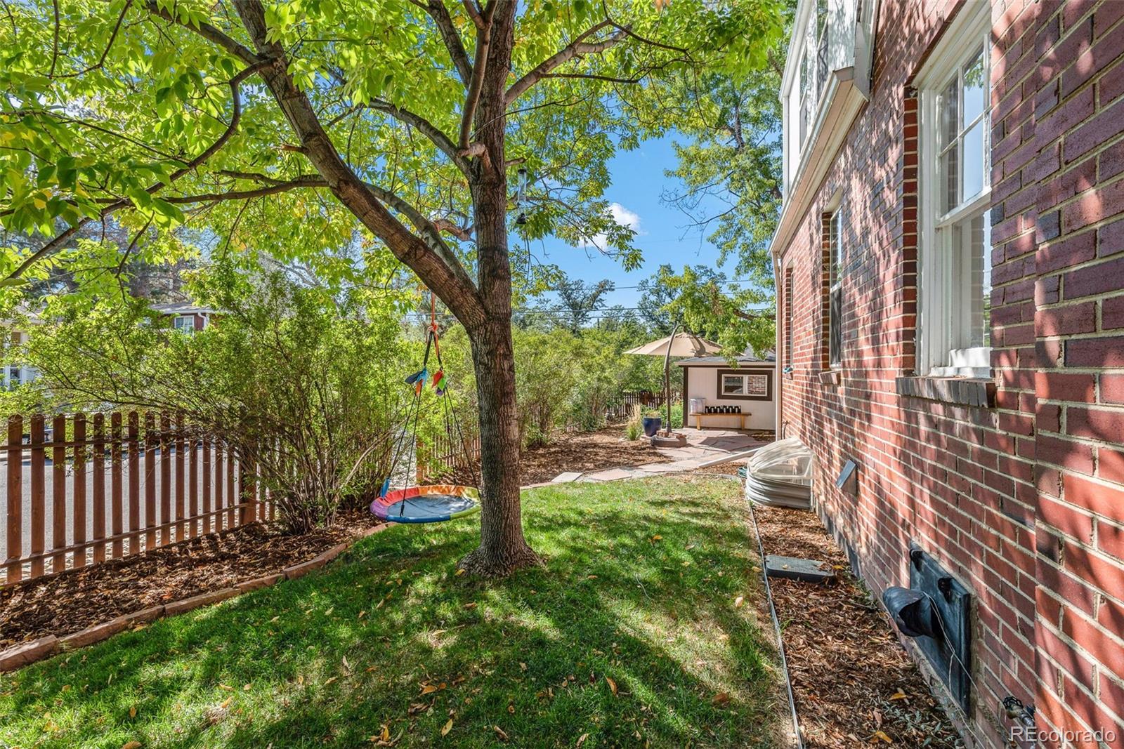 1205 Niagara Street Denver, CO 80220 - Photo 32 of 38 a view of yard with patio