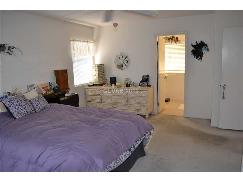 10158 Rice Paper Street Las Vegas, NV 89183 - Photo 13 of 24 Master Bedroom.