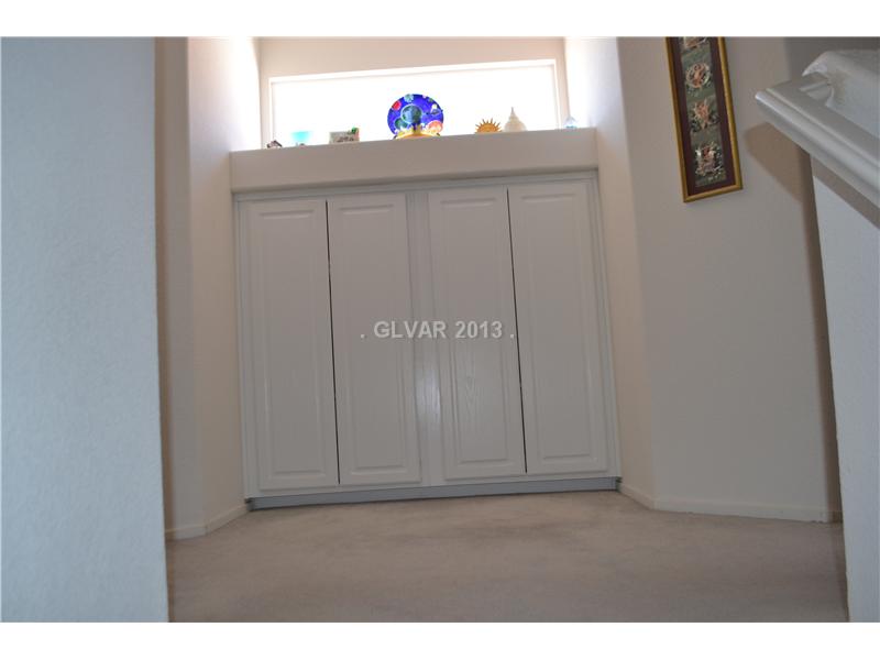 10158 Rice Paper Street Las Vegas, NV 89183 - Photo 19 of 24 Storage. Custom Cabinets upstairs for Linens
