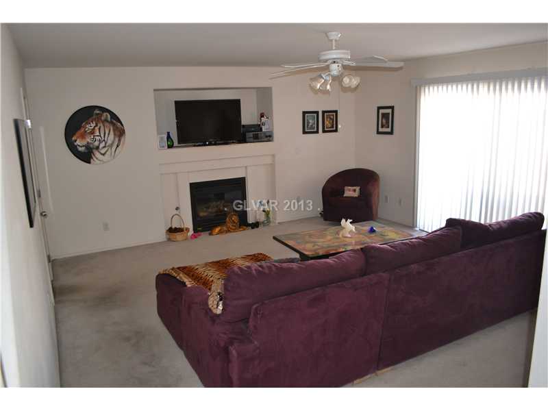 10158 Rice Paper Street Las Vegas, NV 89183 - Photo 8 of 24 Living Room.