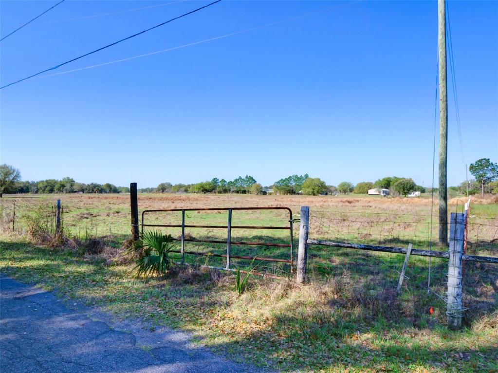 0 614a Bushnell, FL 33513 - Photo 18 of 19 a view of a lake from a yard