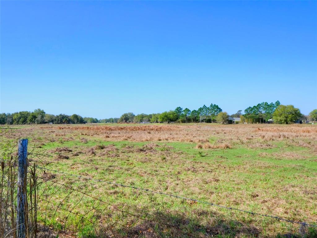 0 614a Bushnell, FL 33513 - Photo 19 of 19 a view of lake with mountain in background