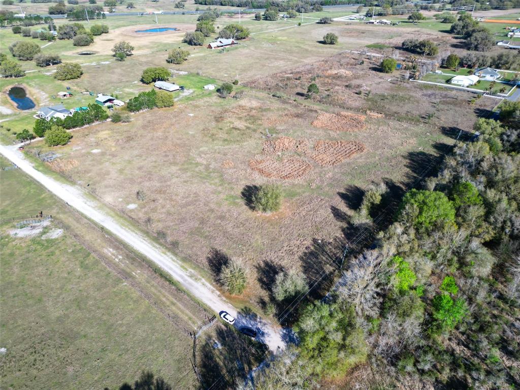 0 614a Bushnell, FL 33513 - Photo 5 of 19 a view of a pathway with a yard