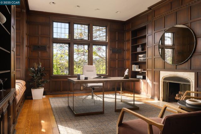 a view of a livingroom with furniture and windows