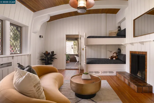 a spacious bedroom with a bed and a large window