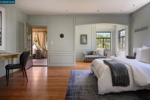 a view of living room with furniture and fireplace
