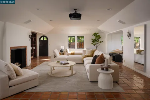 a view of a lounge chair and windows