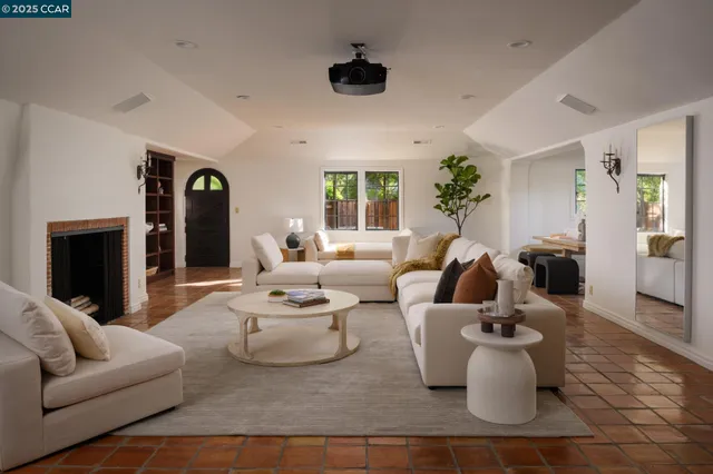 a view of a lounge chair and windows