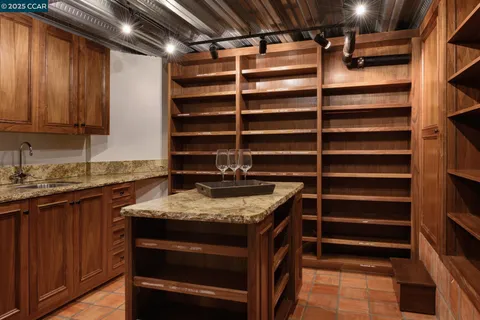 a view of a house with swimming pool and a garden