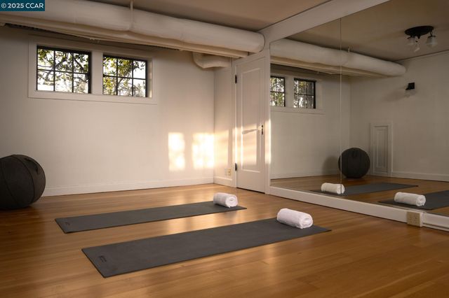 a view of house with yard and seating area