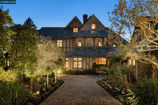 an aerial view of a house with a garden
