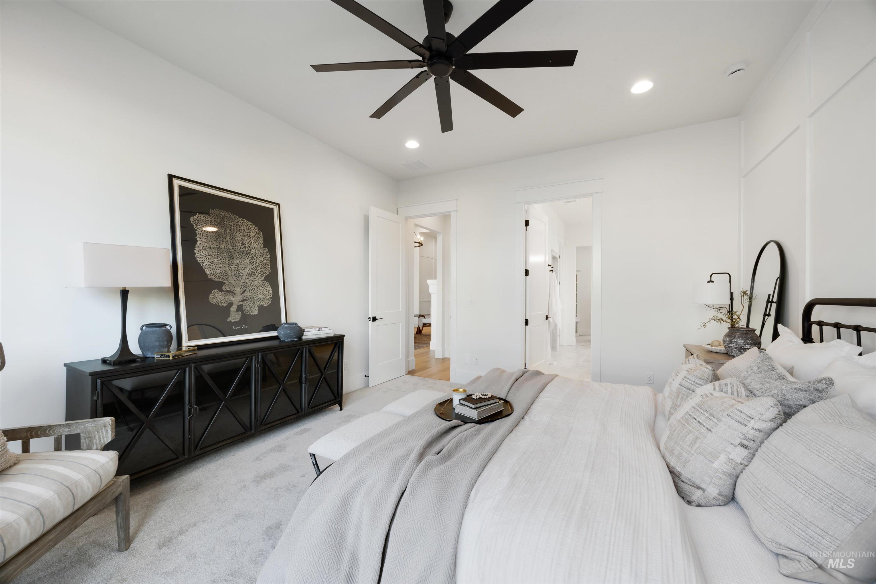 1034 East Escalation Street Meridian, ID 83642 - Photo 21 of 40 Bedroom featuring a ceiling fan, carpet flooring, and recessed lighting