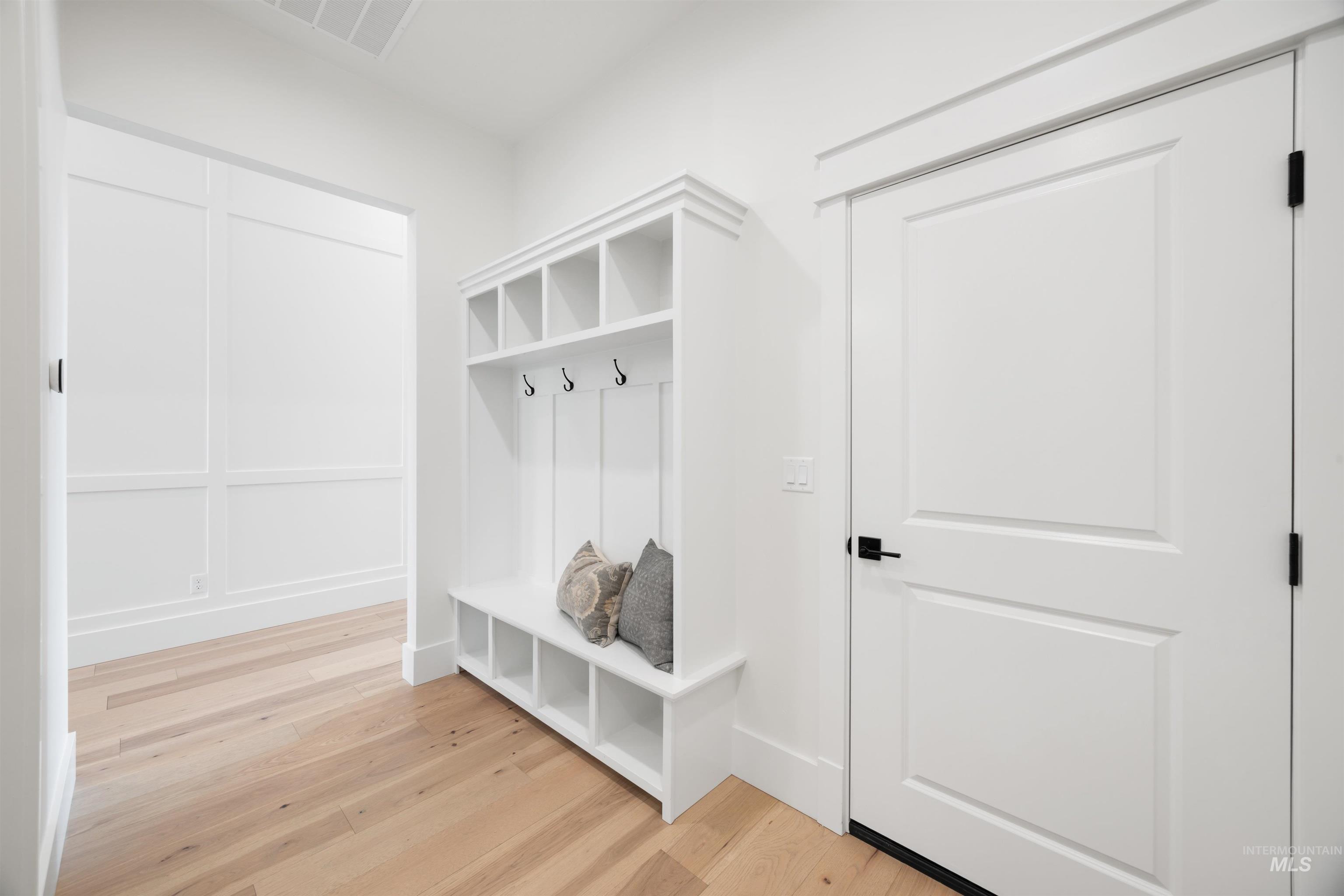 1034 East Escalation Street Meridian, ID 83642 - Photo 28 of 40 Mudroom with light wood finished floors
