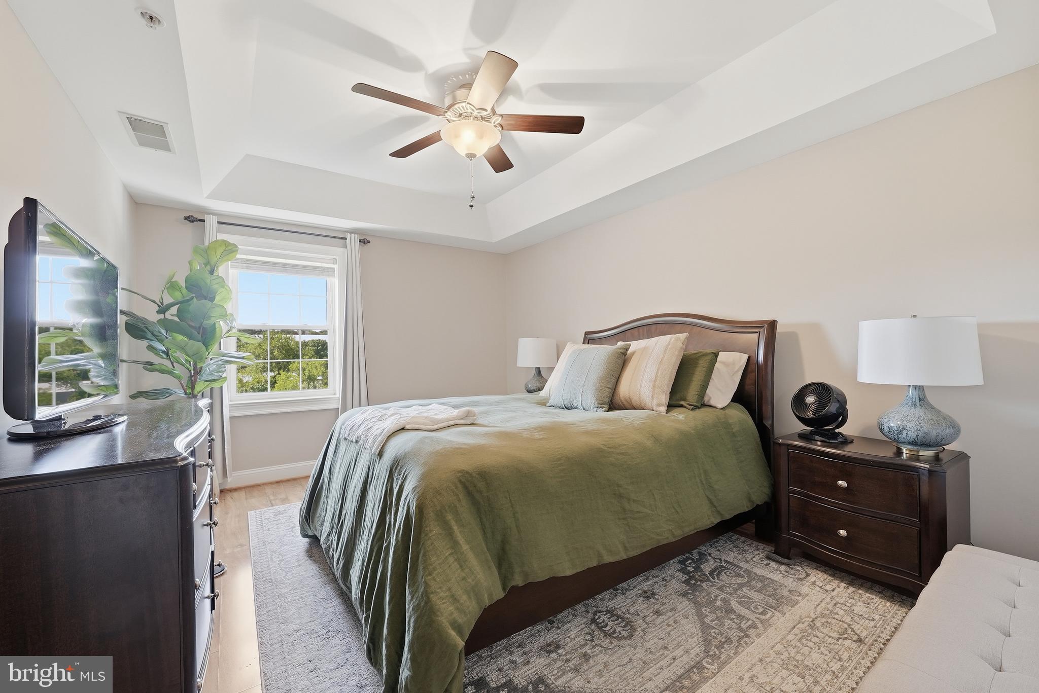 6301 Edsall Road, Unit 519 Alexandria, VA 22312 - Photo 18 of 33 a bedroom with a bed and window