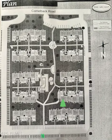 a room with pool table and windows