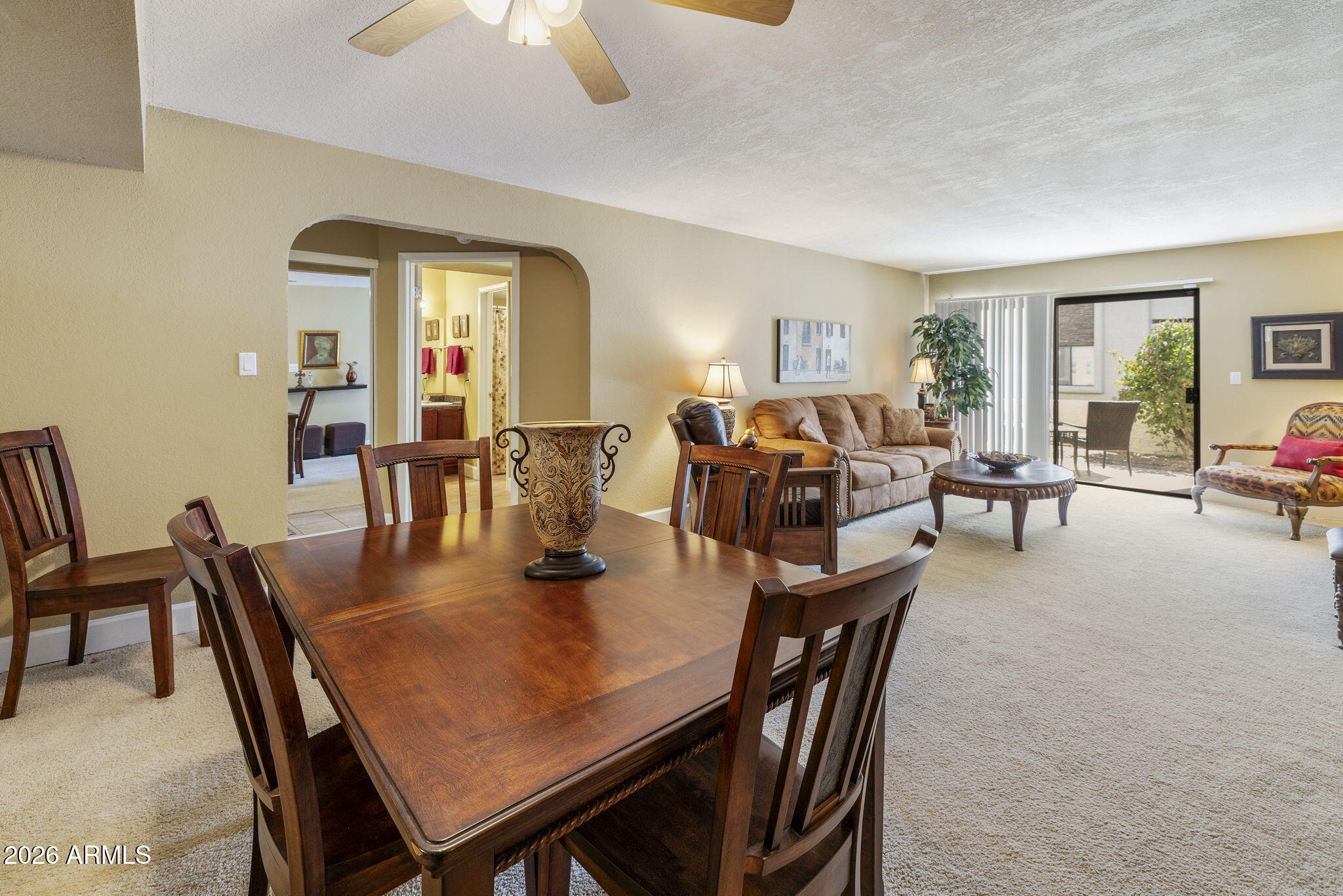 3825 East Camelback Road, Unit 126 Phoenix, AZ 85018 - Photo 6 of 28 a view of a dining room with furniture