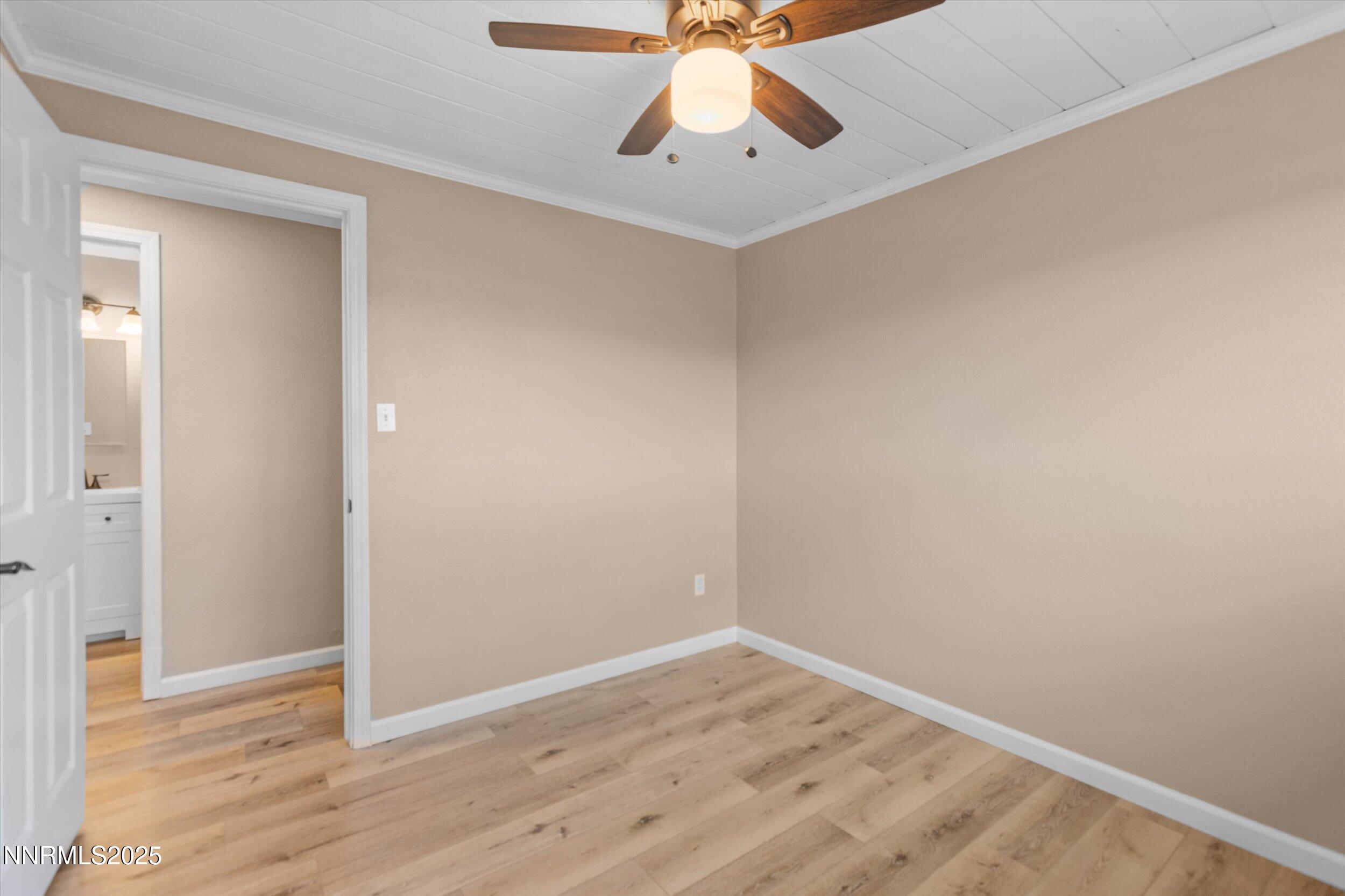 11567 Tupelo Street Reno, NV 89506 - Photo 15 of 32 a view of an empty room with a window