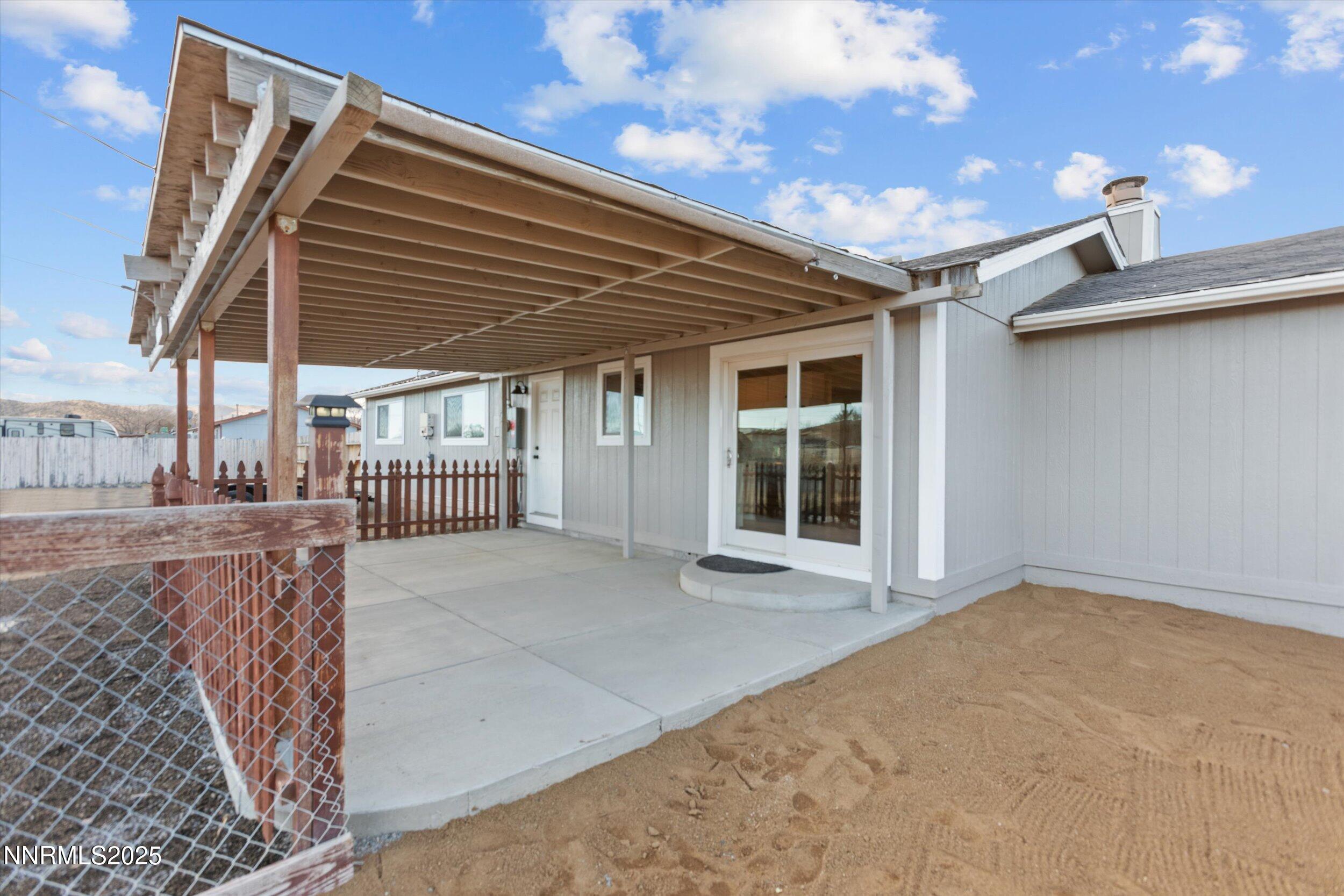 11567 Tupelo Street Reno, NV 89506 - Photo 21 of 32 a view of a house with a balcony