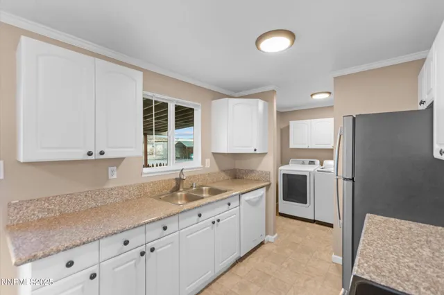 a kitchen with a sink stove and refrigerator