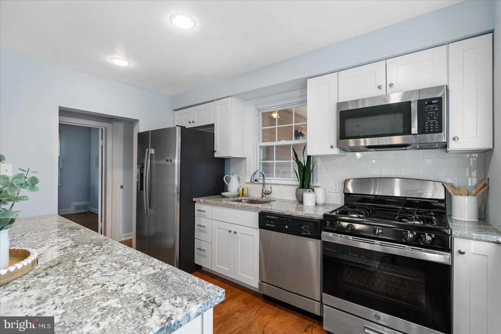 409 Upland Road Baltimore, MD 21208 - Photo 11 of 43 Kitchen With Stainless Steel Appliances