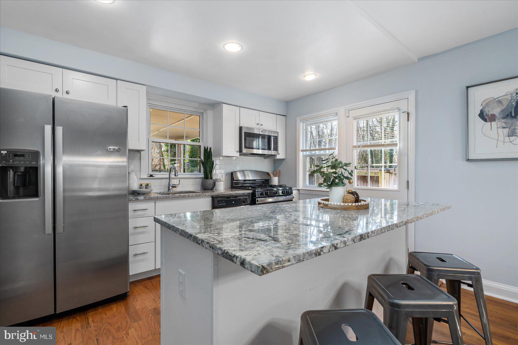 409 Upland Road Baltimore, MD 21208 - Photo 10 of 43 Kitchen With Breakfast Bar