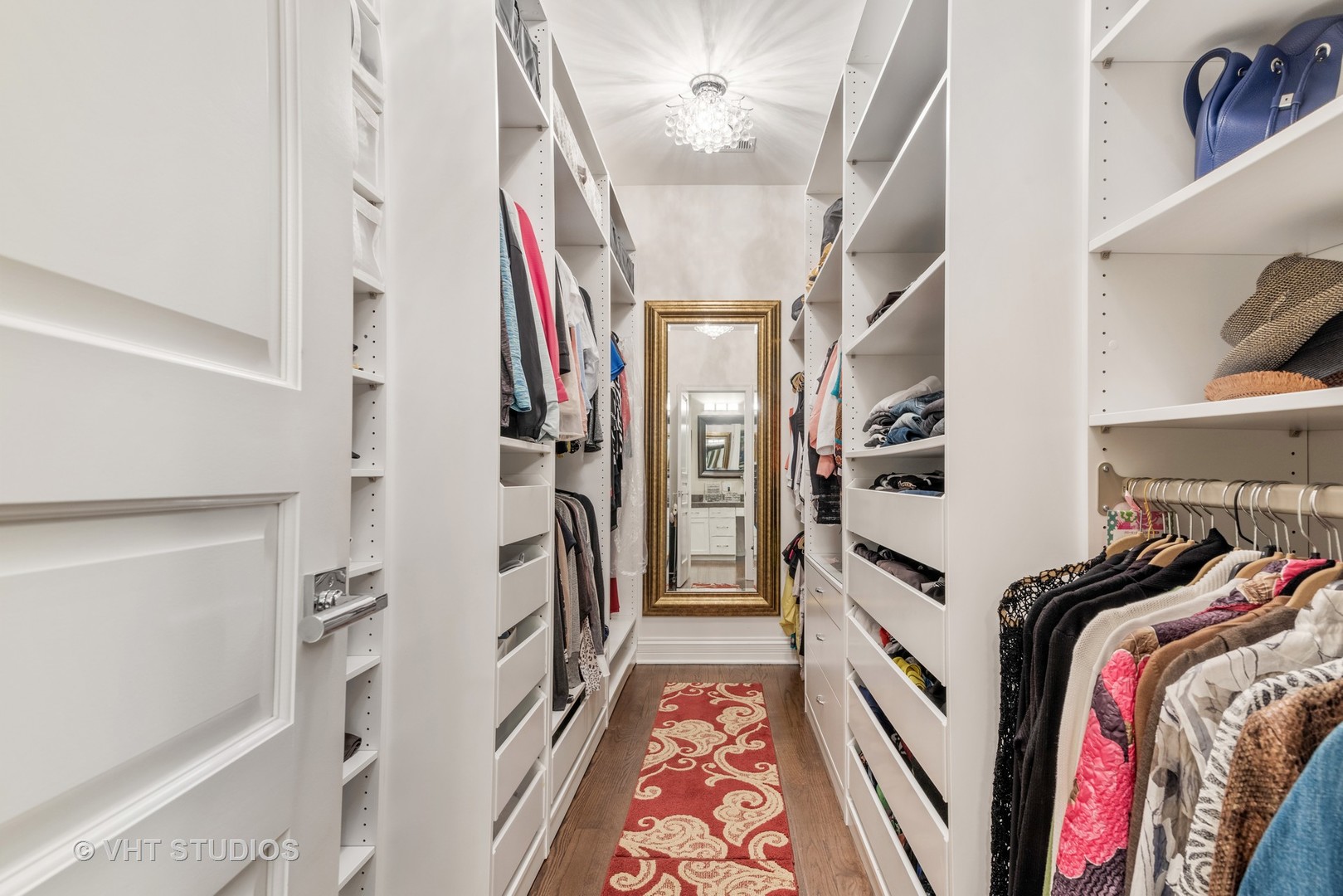 30 Meadowview Road Winnetka, IL 60093 - Photo 23 of 34 a view of walk in closet with clothes and shoes