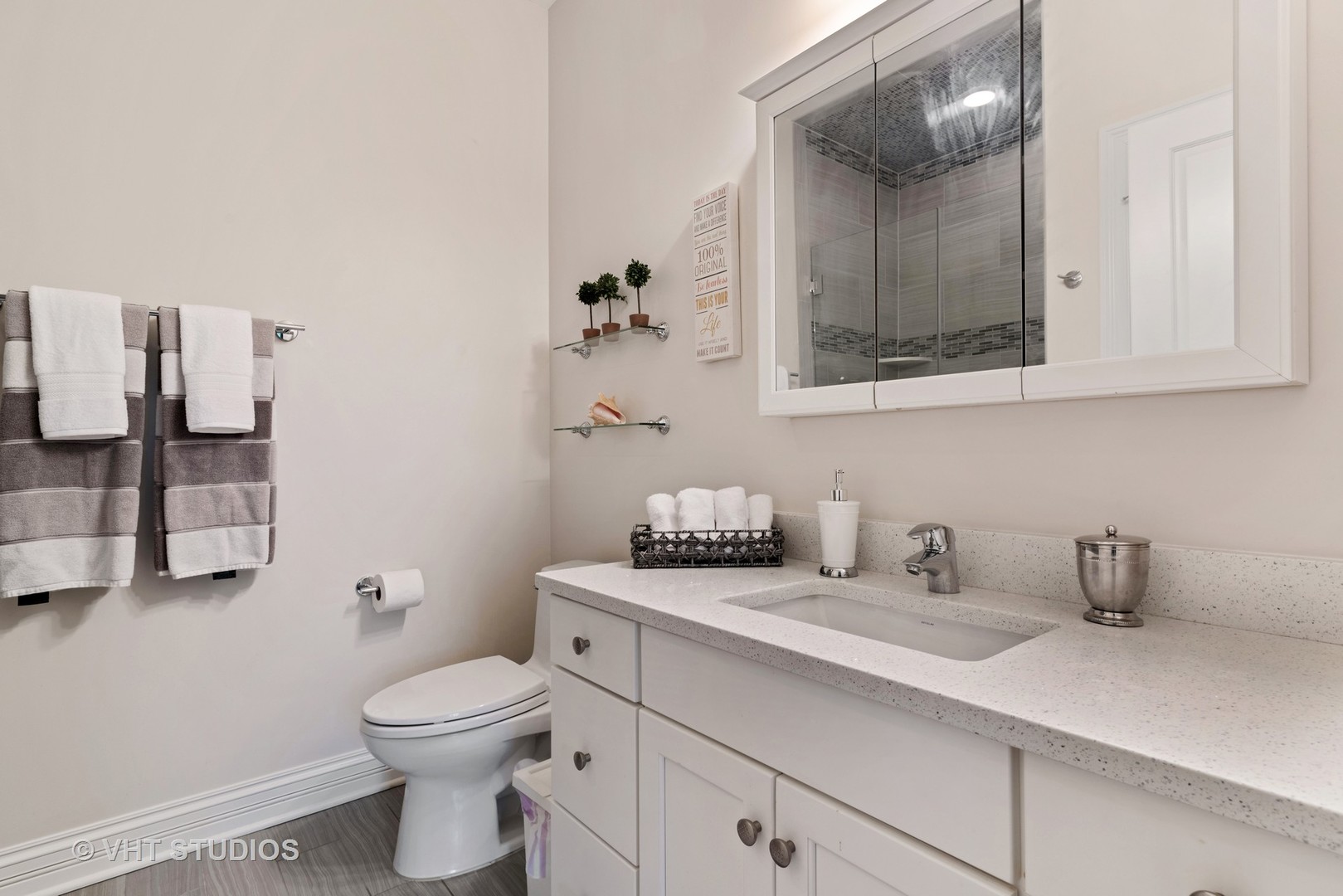 30 Meadowview Road Winnetka, IL 60093 - Photo 29 of 34 a bathroom with a toilet sink and mirror