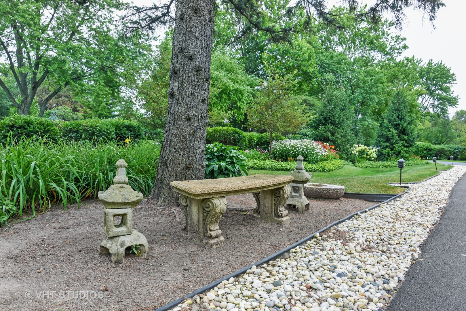 30 Meadowview Road Winnetka, IL 60093 - Photo 34 of 34 a view of a table and chairs in backyard of the house