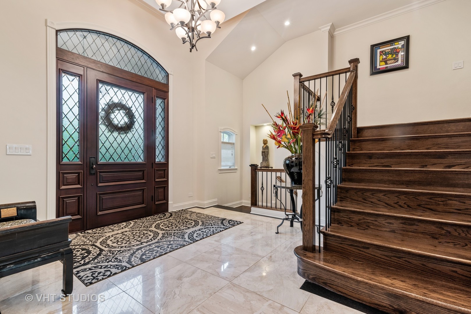 30 Meadowview Road Winnetka, IL 60093 - Photo 5 of 34 a bedroom with a bed and a chandelier