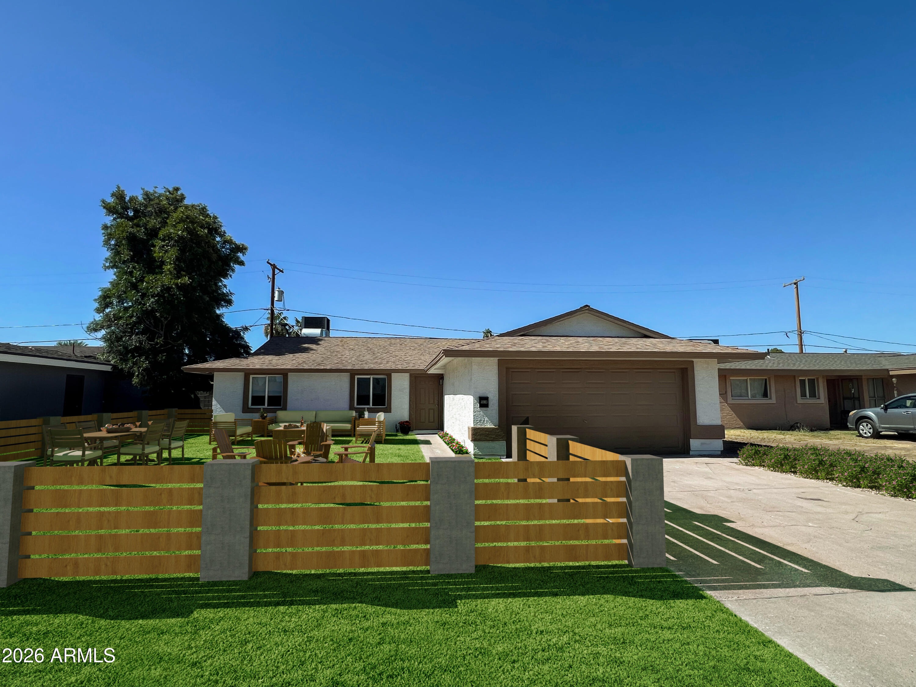 3818 West Ruth Avenue Phoenix, AZ 85051 - Photo 12 of 20 a front view of a house with a yard