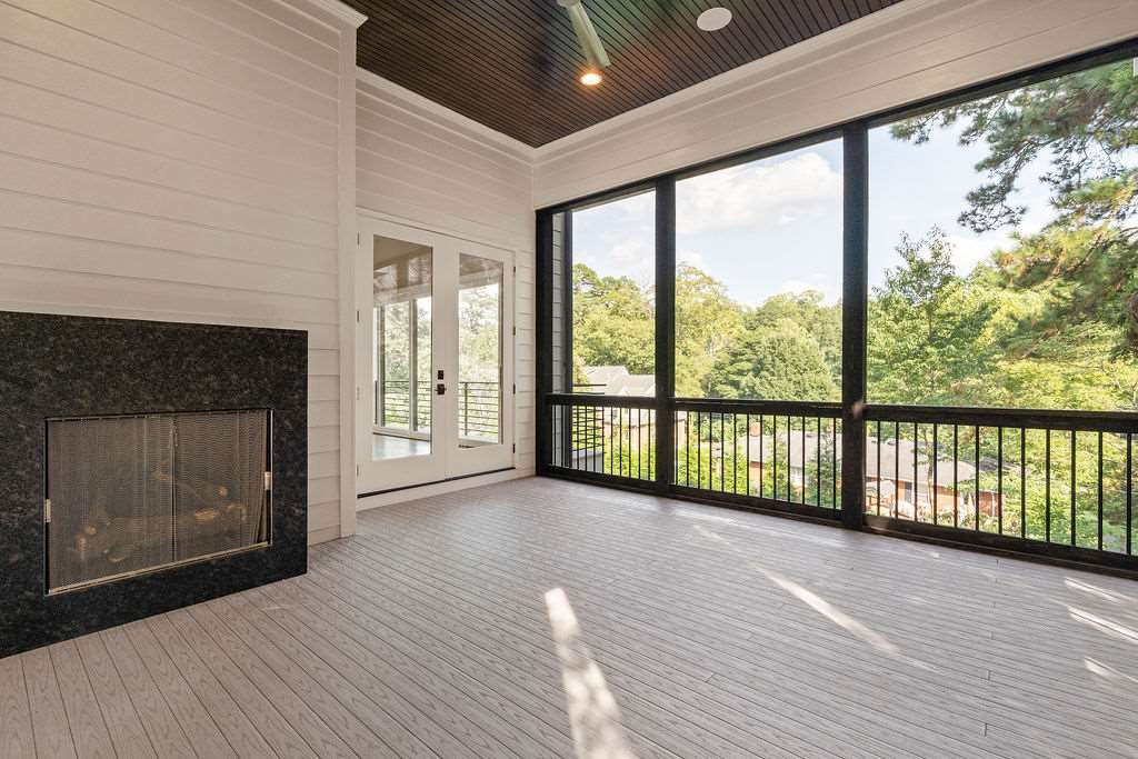1728 Nottingham Road Raleigh, NC 27607 - Photo 26 of 30 Screened Porch w/ Gas Fireplace