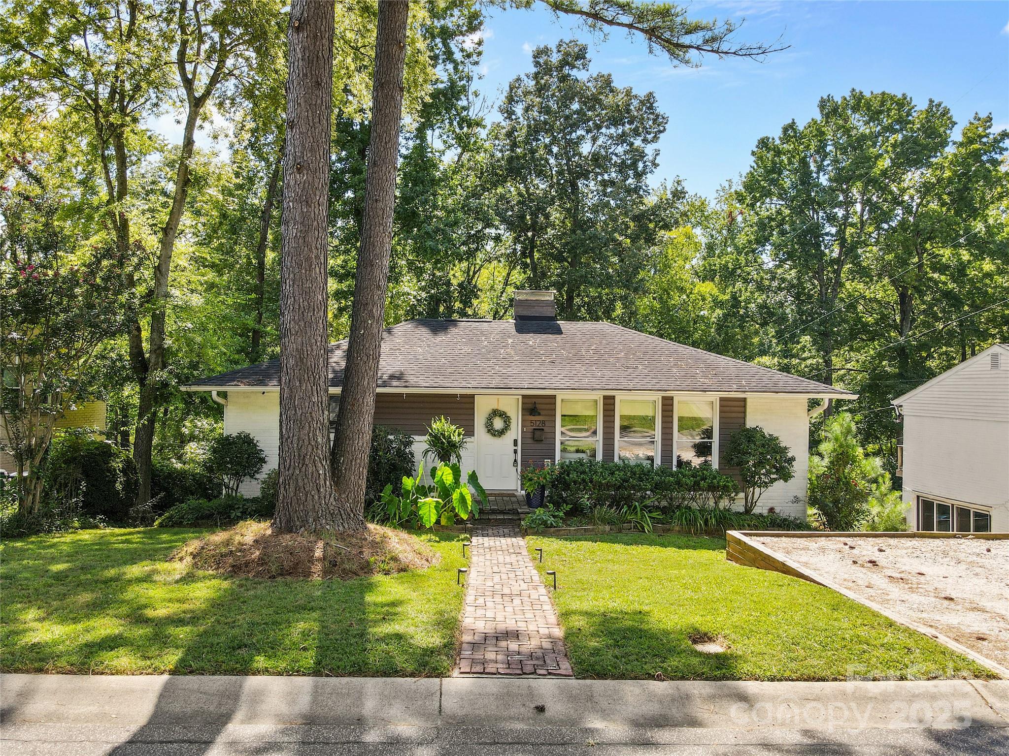 a view of a house with garden