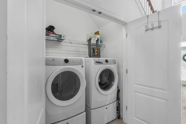 a utility room with dryer and washer