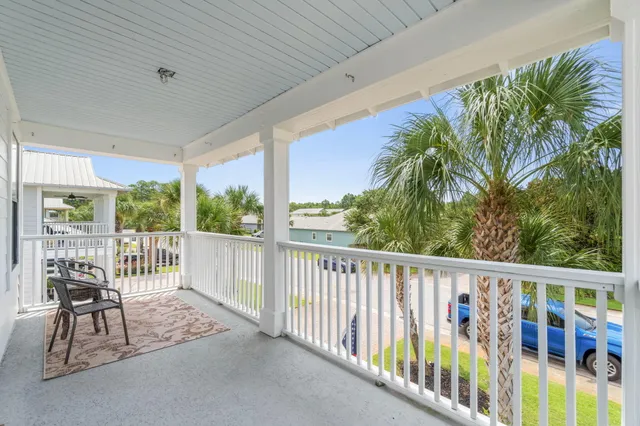a view of balcony with furniture