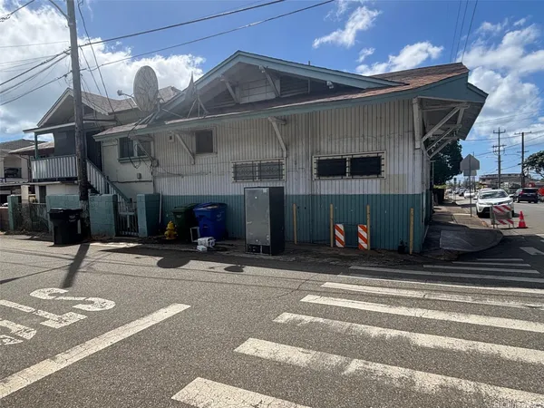 a view of a house and a yard