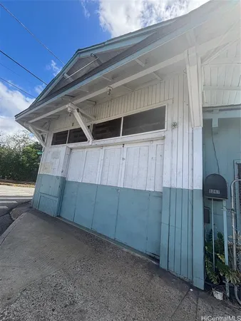 a front view of a house with a garage