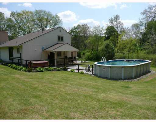 141 Harmony Road Wexford, PA 15090 - Photo 9 of 14 Swimming Pool/Hot Tub/Sauna. Great for Relaxation or Entertaining. Nice covered rear patio and large open area for guests!