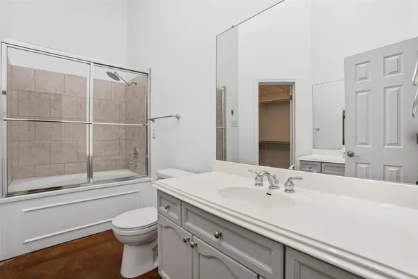 a view of a balcony with a pot