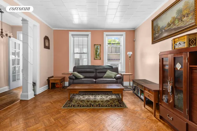a living room with furniture and a rug