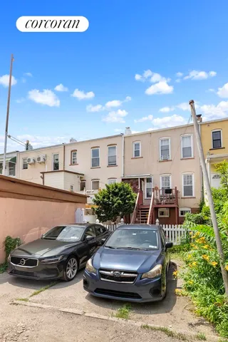 a car parked in front of a house