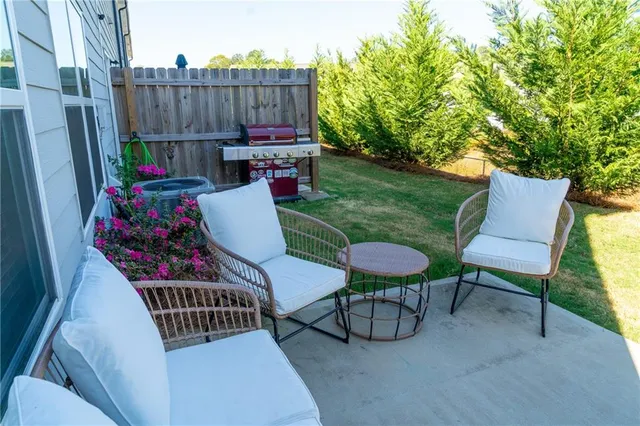 a view of balcony patio and outdoor seating