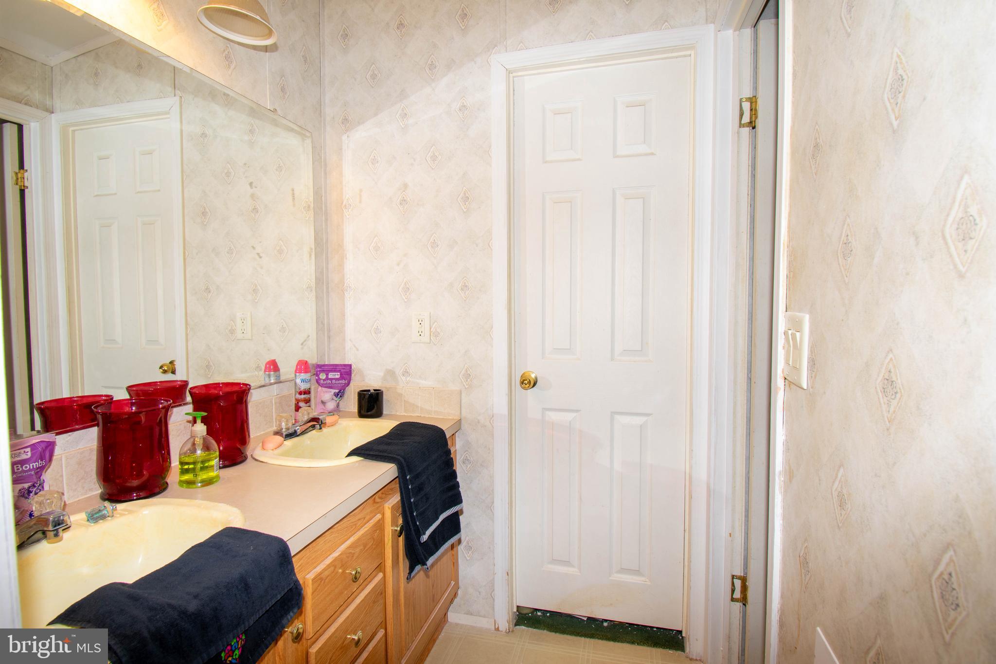 8791 Menokin Road Montross, VA 22520 - Photo 29 of 37 a bedroom with a bed and a dresser