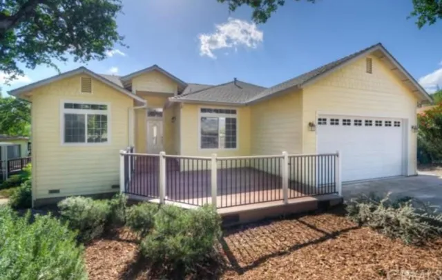 a view of a house with a deck