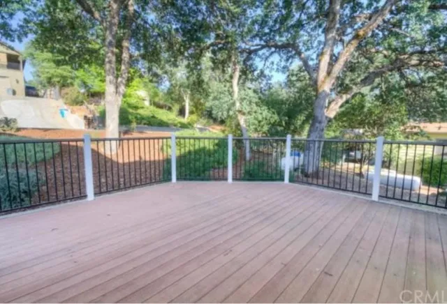 a view of a deck with a lake view