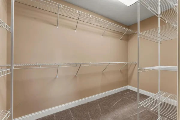 a bathroom with a double vanity sink and mirror