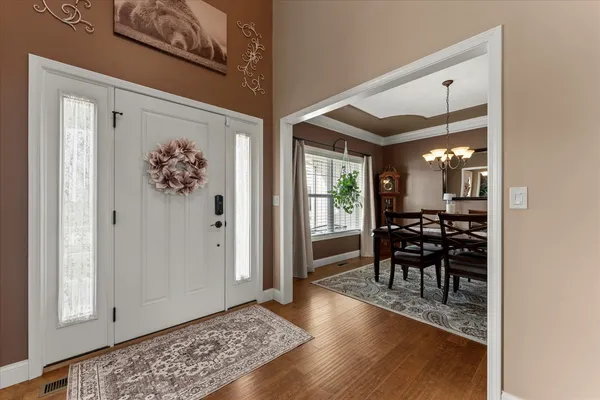 a view of a dining room with furniture window and outside view