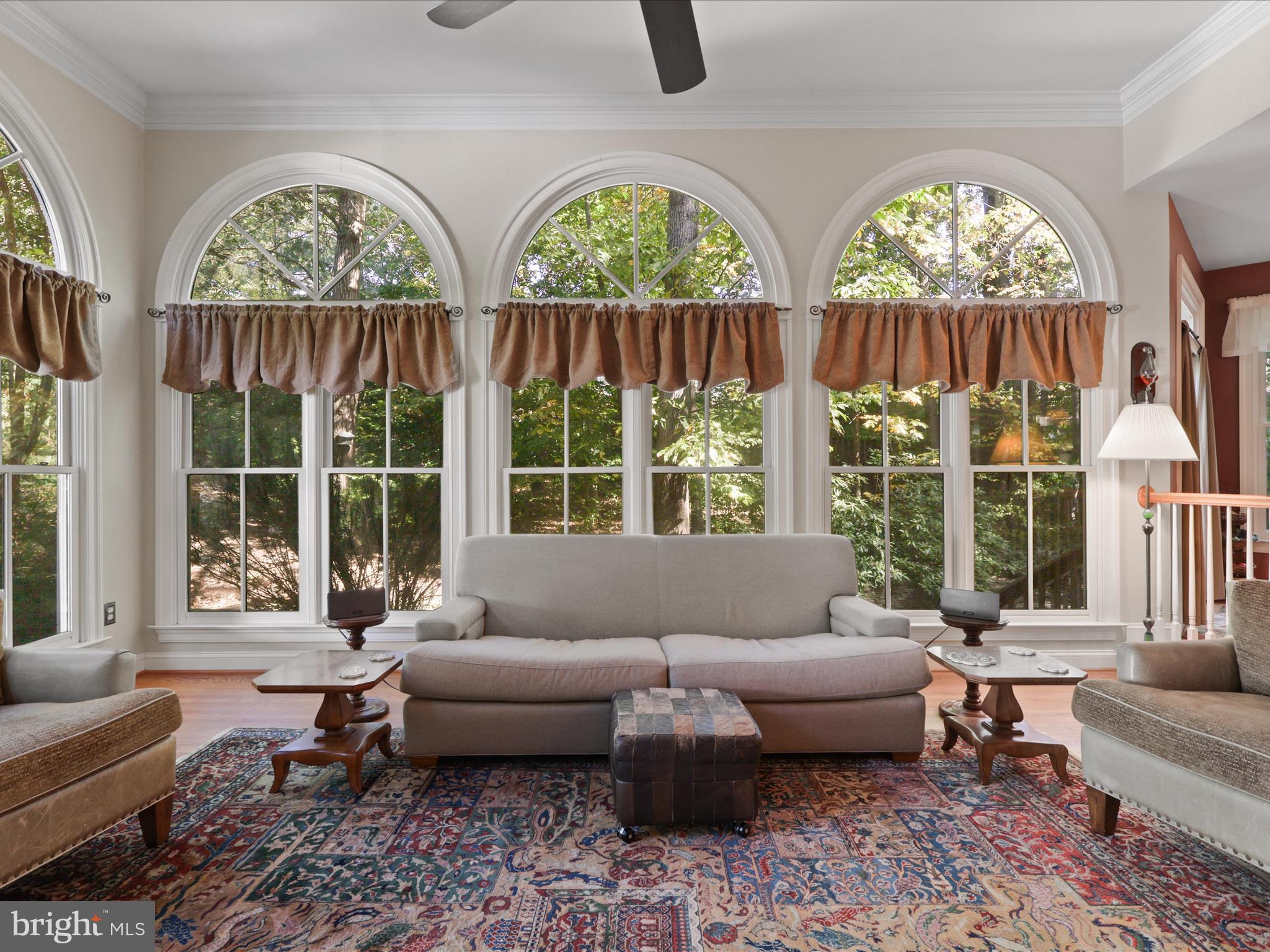12848 Redbird Ridge Clifton, VA 20124 - Photo 19 of 76 a living room with furniture and a large window