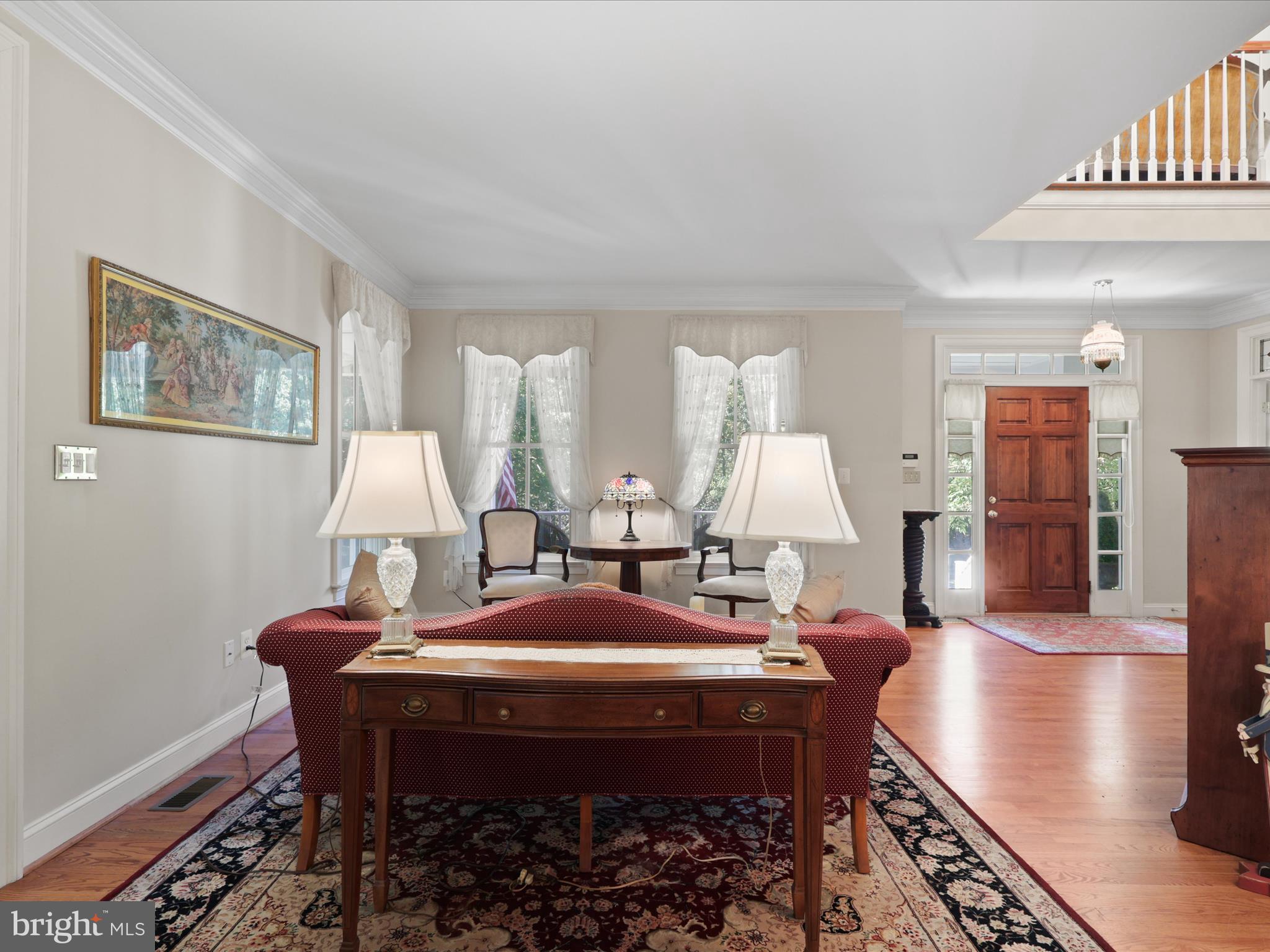 12848 Redbird Ridge Clifton, VA 20124 - Photo 21 of 76 a view of a dining room with furniture window and wooden floor