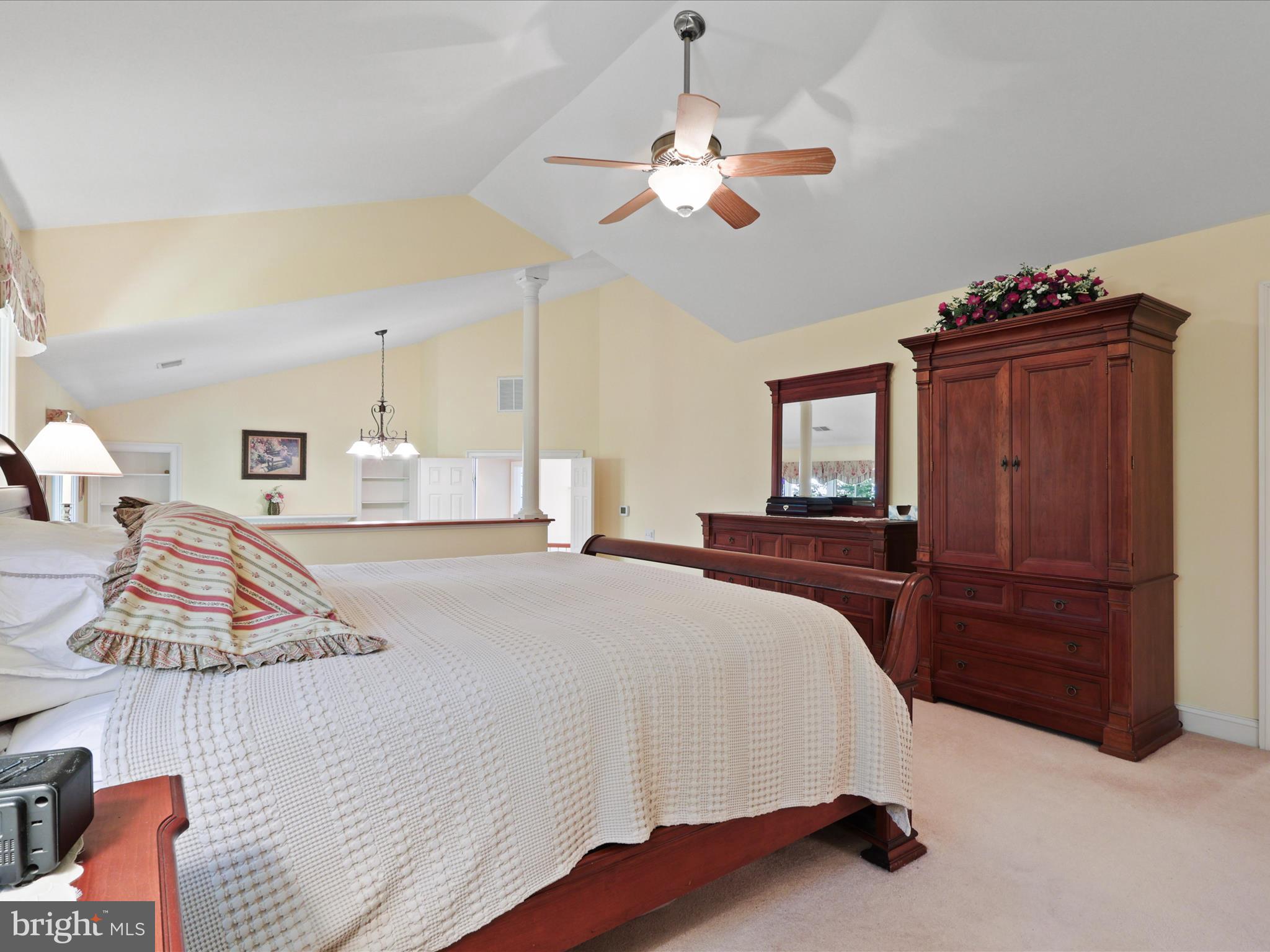 12848 Redbird Ridge Clifton, VA 20124 - Photo 29 of 76 a spacious bedroom with a bed and dresser
